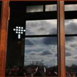 Reflecting on the Season.I was taking pictures at our church Christmas concert, when I noticed the clouds reflecting on the windows into the sanctuary.